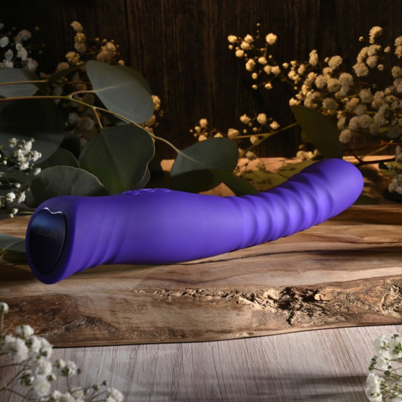 Фиолетовый вибростимулятор Trixxxie - 22,2 см. Фиолетовый вибростимулятор Trixxxie - 22,2 см.