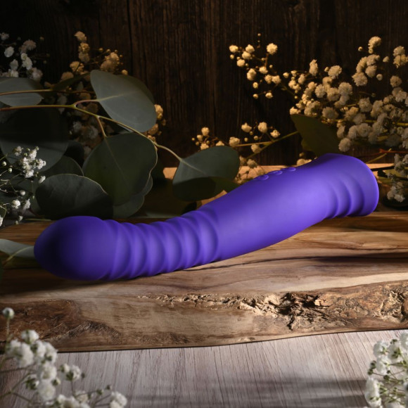 Фиолетовый вибростимулятор Trixxxie - 22,2 см. Фиолетовый вибростимулятор Trixxxie - 22,2 см.